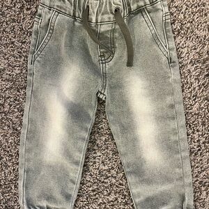 Lightly worn Little Bipsy 12-18 months green faded jeans.